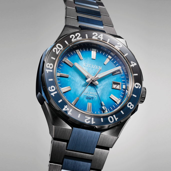 Citizen Series 8 GMT watch with blue dial and bezel, close-up shot.