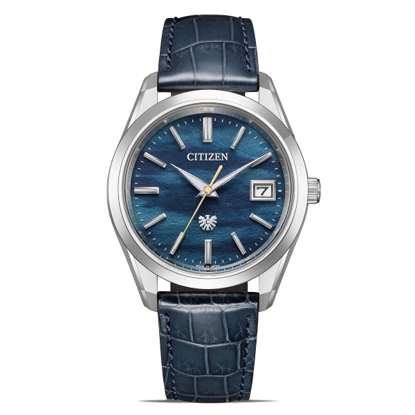 Citizen watch with blue face and leather strap, elegant design