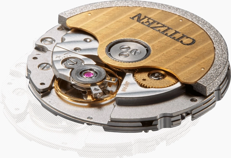 Close-up of a Citizen watch mechanism, showing intricate details and gears.