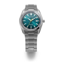 A silver Citizen Eco-Drive Titanium watch with a green dial.