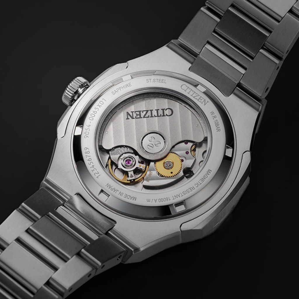 Citizen watch back with visible mechanism, sapphire, and stainless steel.