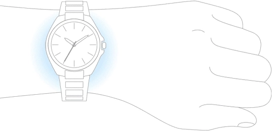 A wrist with a watch on it, the hand is in a fist.