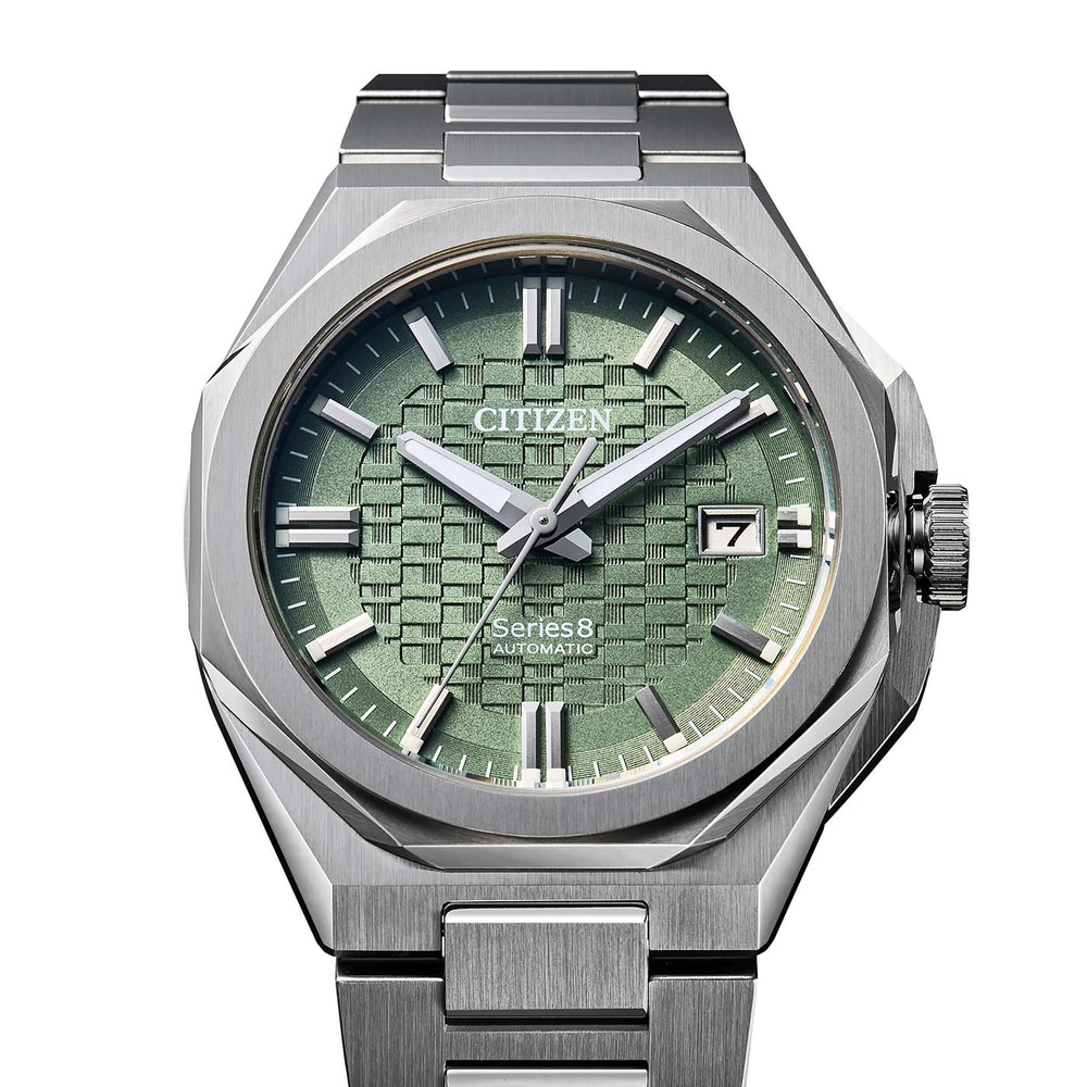 A close-up shot of a green Citizen Series 8 automatic watch.