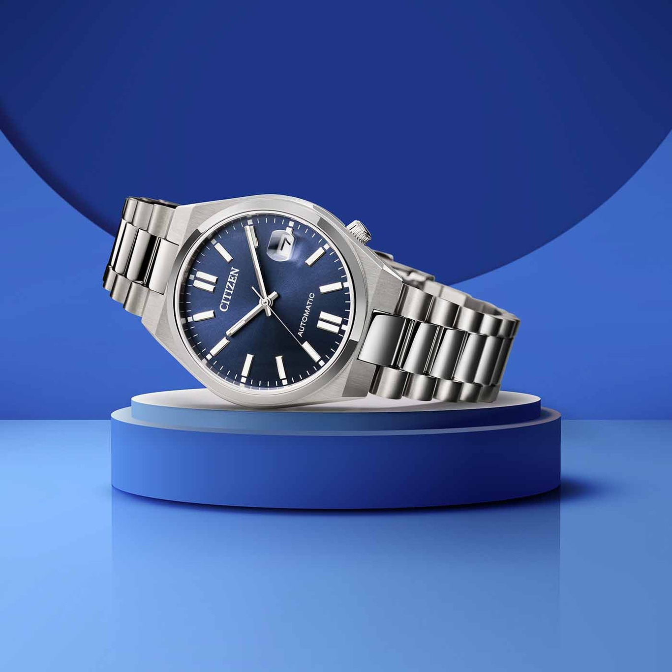 Citizen watch on a blue platform, blue background, automatic watch