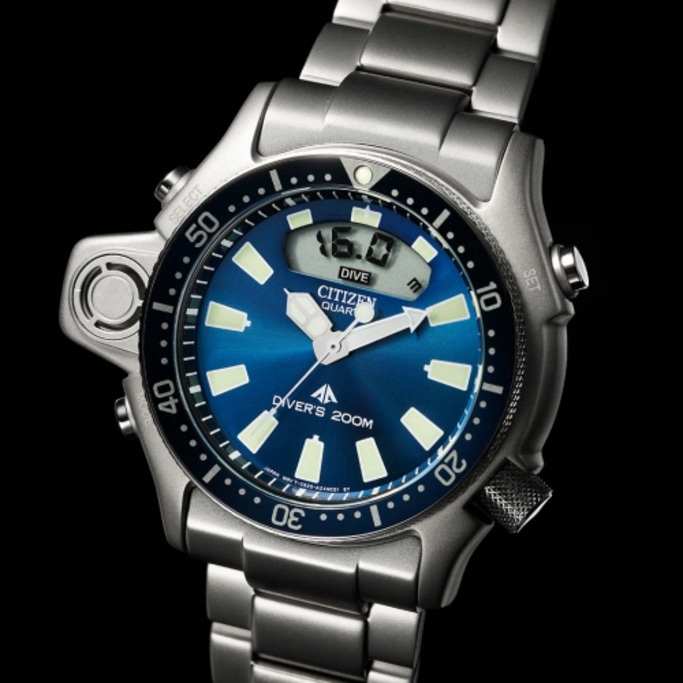 Citizen watch with blue face, digital display, and diver's 200m rating.
