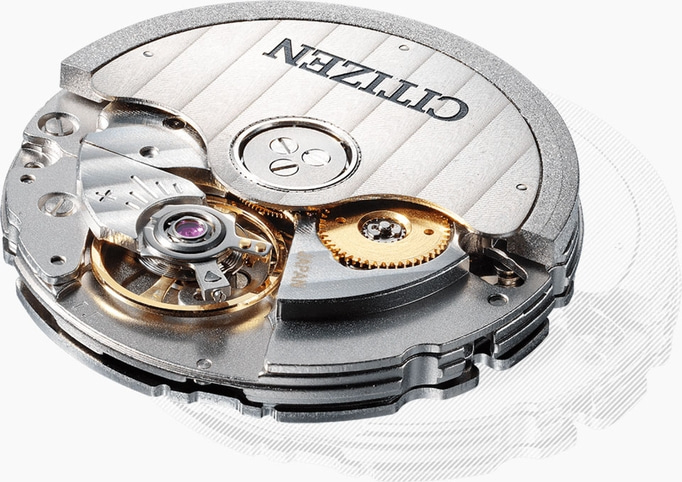 Close-up of a Citizen watch mechanism with intricate gears and details.