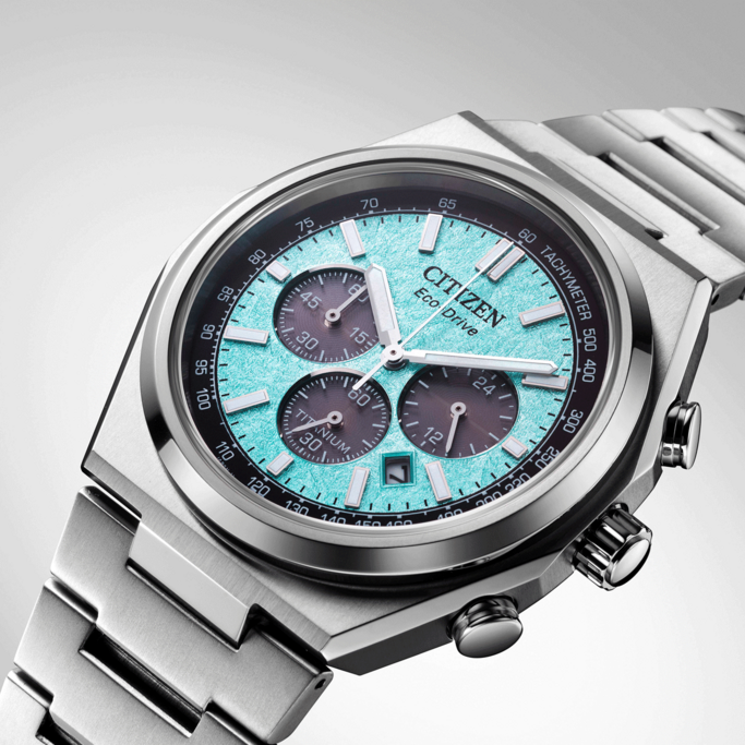 Citizen Eco-Drive watch with a blue face and titanium band.