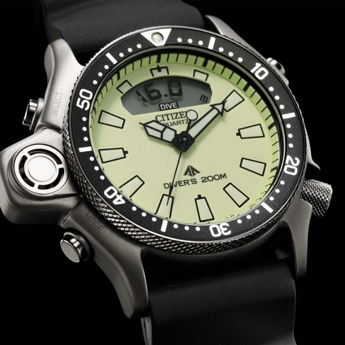 Citizen dive watch with black bezel and digital display, showing depth.