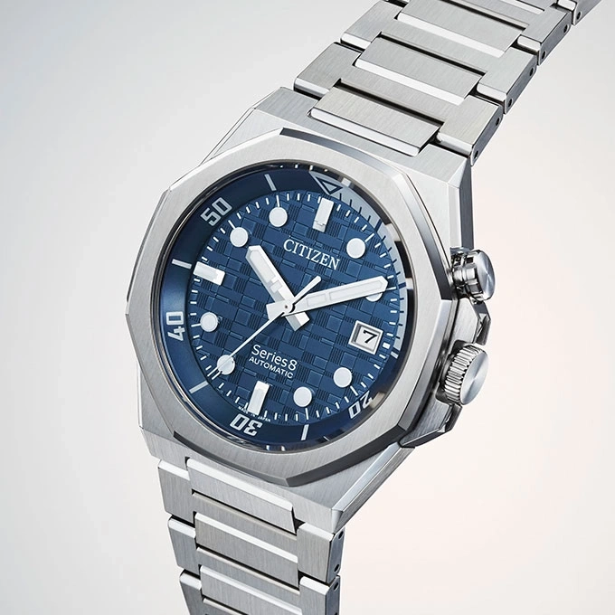 Citizen Series 8 automatic watch with blue dial and steel bracelet.