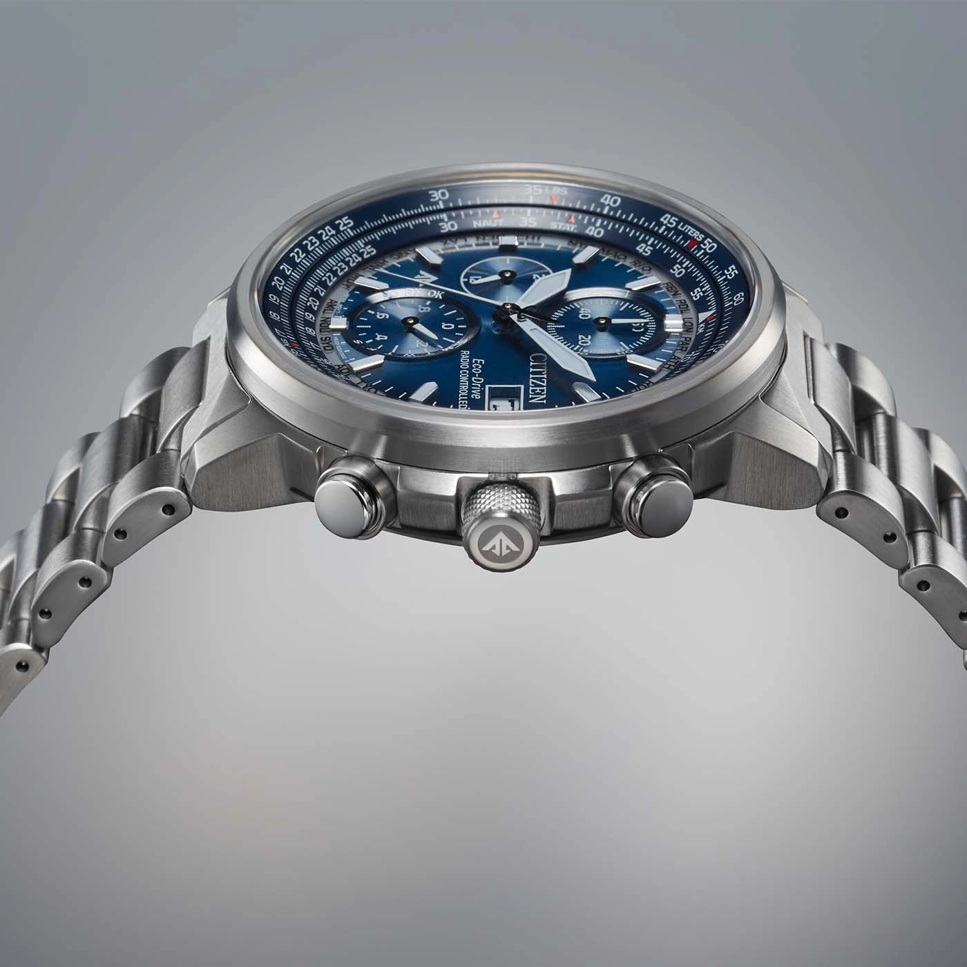 Citizen watch with blue face and metal band, Eco-Drive, radio controlled.