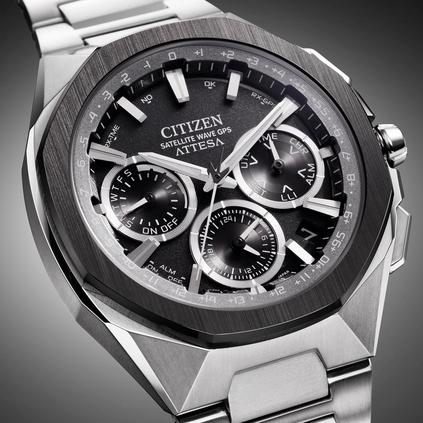 Close-up of a Citizen Attesa watch with a black dial and silver bracelet.