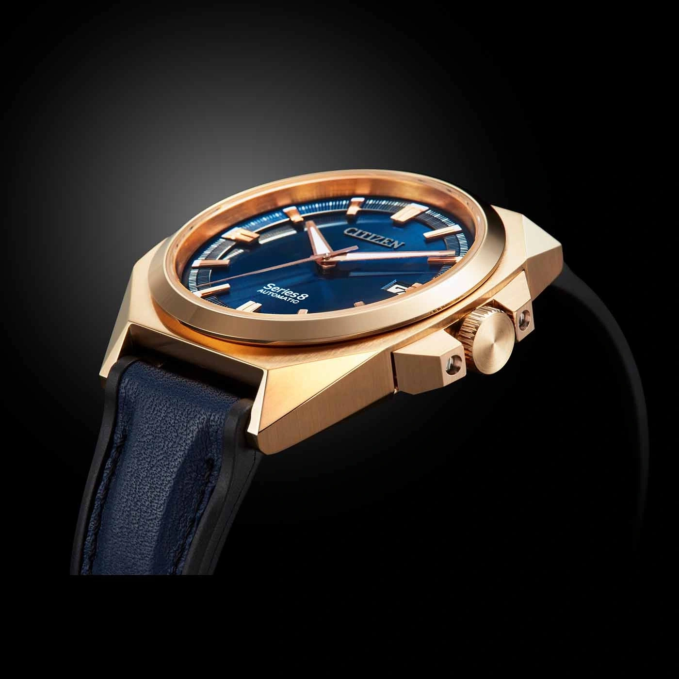 Gold watch with blue face and strap, Citizen Series 8 Automatic.