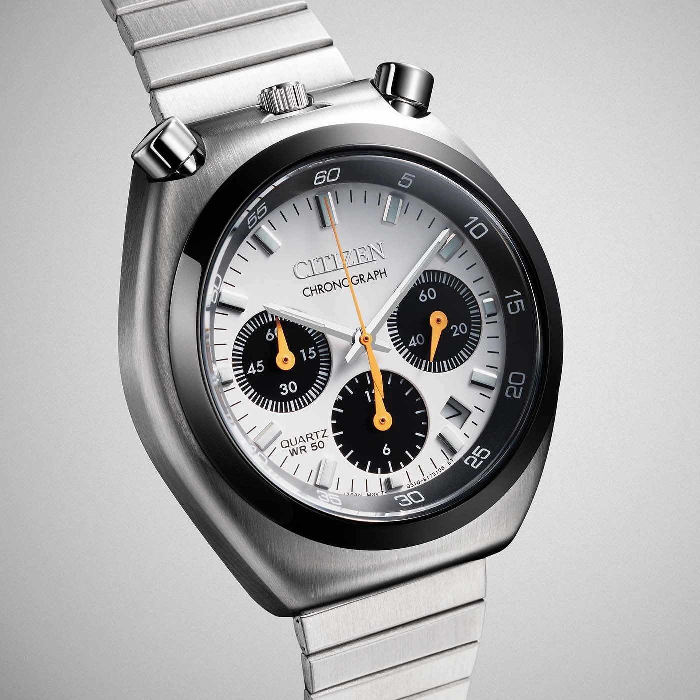 A close-up shot of a silver Citizen chronograph watch with a white dial and black sub-dials.