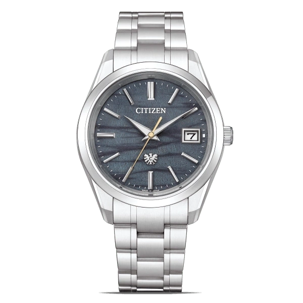 Citizen watch with a silver band and a dark blue face with the date.