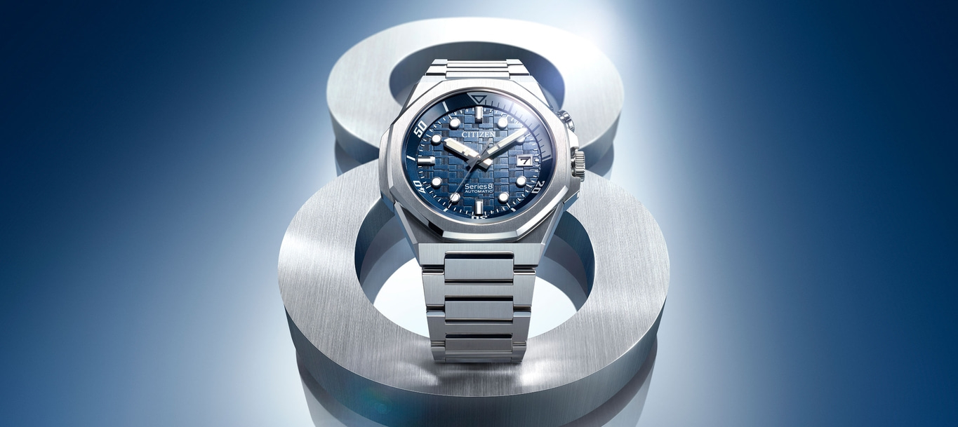 Citizen Series 8 watch, blue dial, stainless steel, on a metallic 8 shape