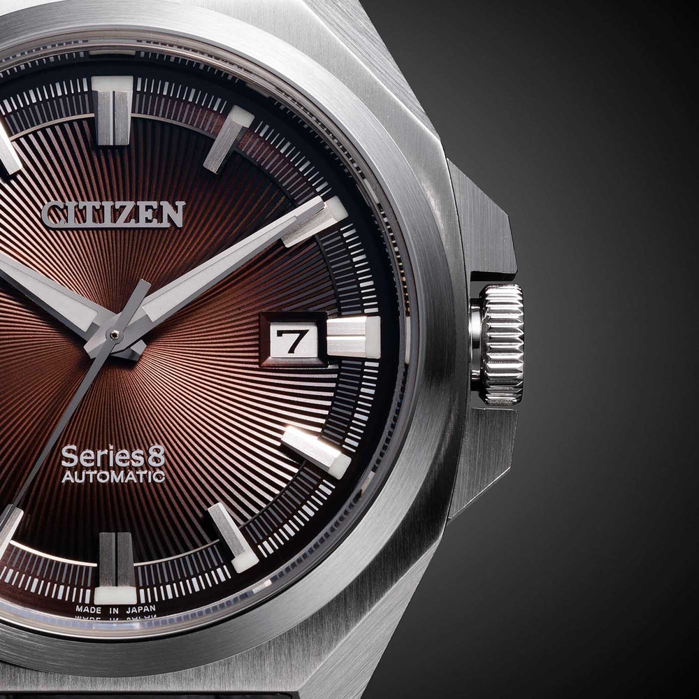 Close-up of a Citizen Series 8 automatic watch with a brown dial.