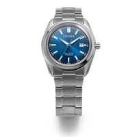 A close-up shot of a Citizen Eco-Drive Titanium watch with a blue dial and steel band, set against a white background.