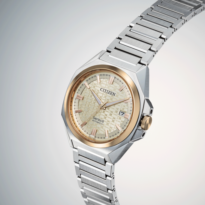 Citizen Series 8 automatic watch with gold and silver accents, close-up shot