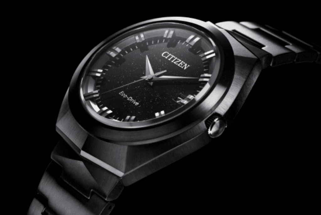 Citizen watch with black face and metal strap, Eco-Drive technology.