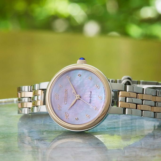 Citizen Eco-Drive watch with a mother-of-pearl dial and gold accents.