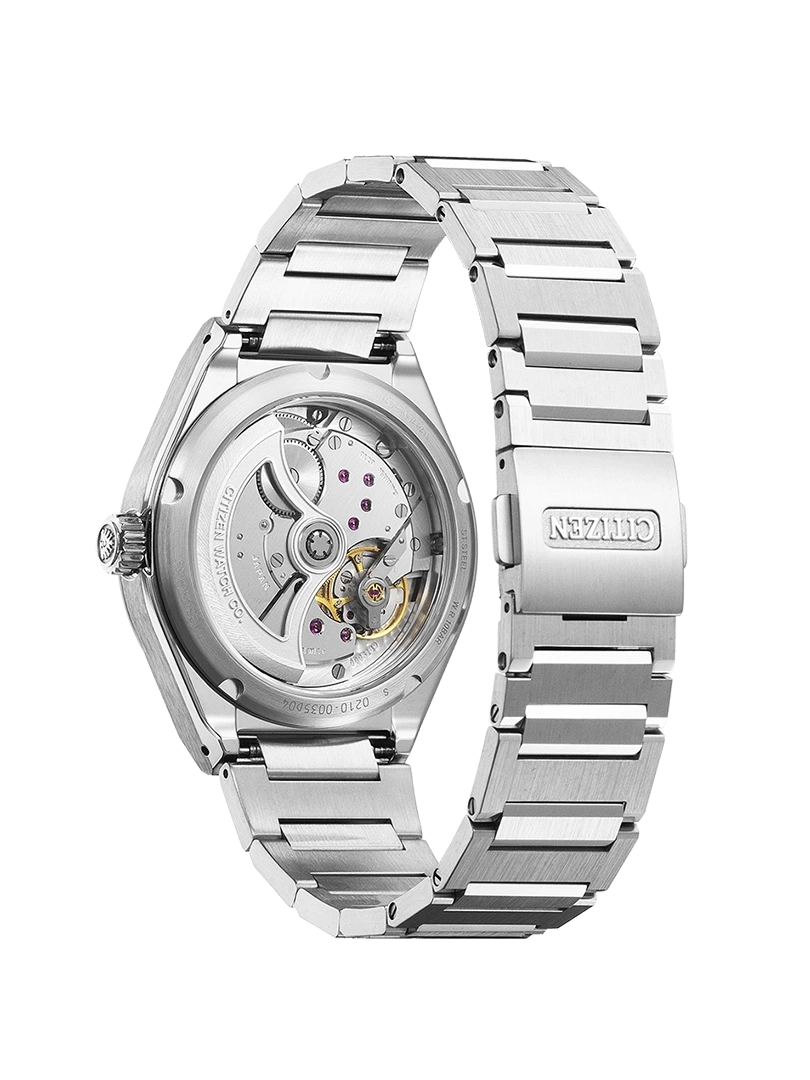 Citizen watch back with visible mechanism and metal strap, close-up.