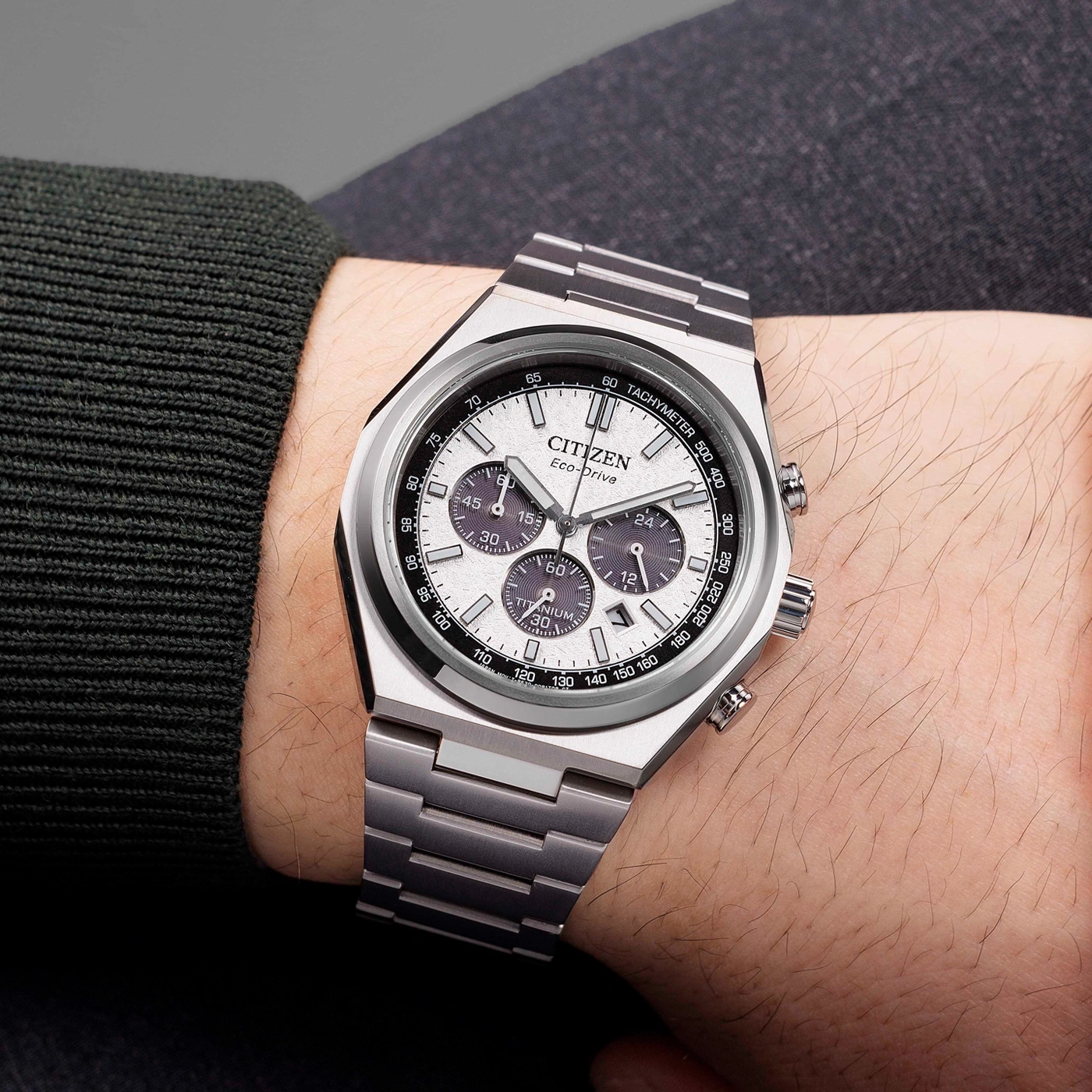 Citizen watch on wrist, silver titanium, Eco-Drive, chronograph, tachymeter, close-up