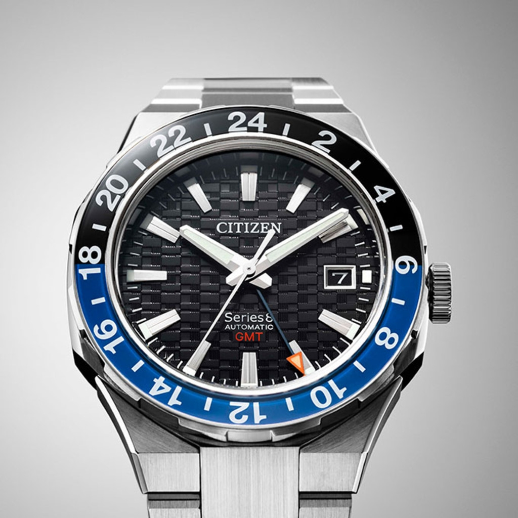 Citizen Series 8 GMT watch with black and blue bezel and date display