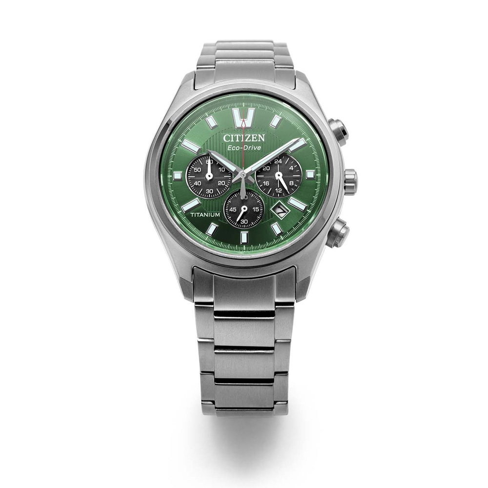 A silver Citizen Eco-Drive watch with a green dial and silver band is displayed.