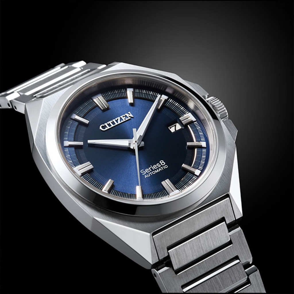 Citizen Series 8 automatic watch with a blue dial and silver bracelet.