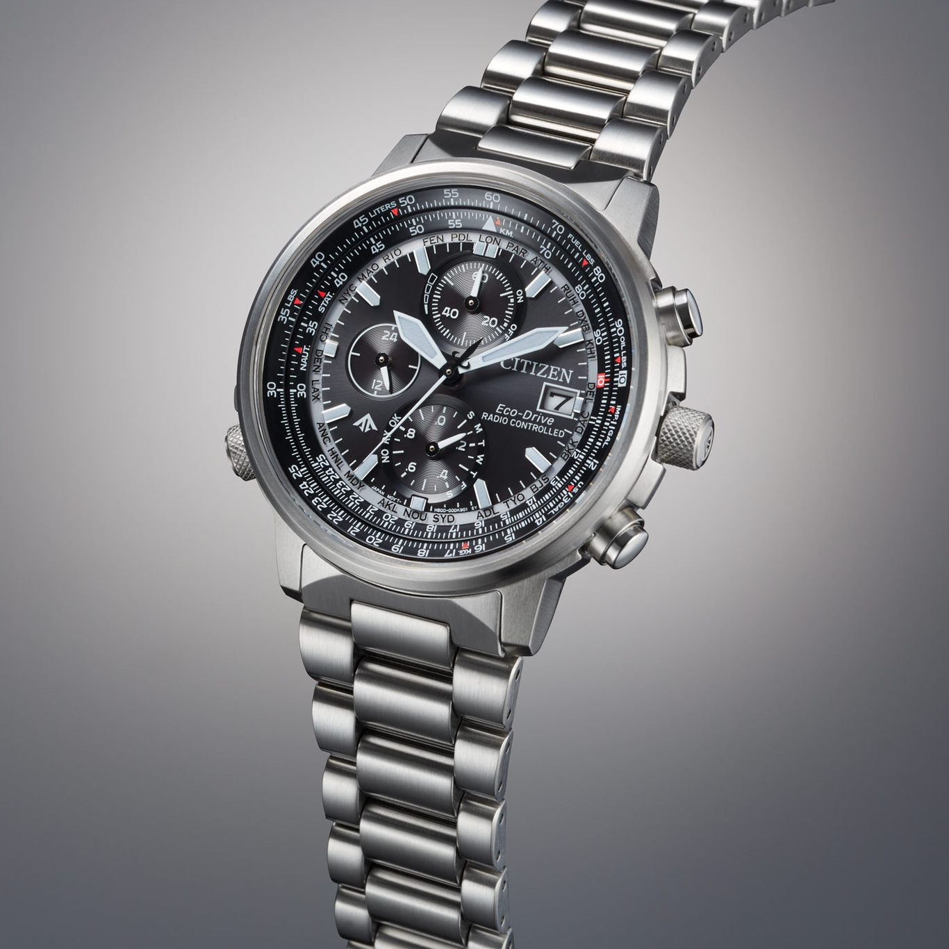 Citizen watch with black face, silver band, and multiple dials, showing time and date.