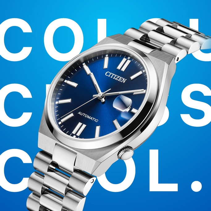 Citizen watch with blue face and silver strap, automatic, on blue background.
