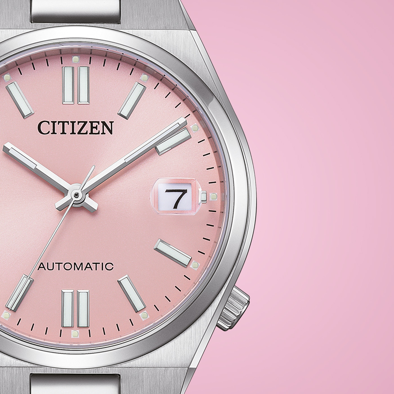 Citizen watch with pink face, silver hands and date display, automatic.