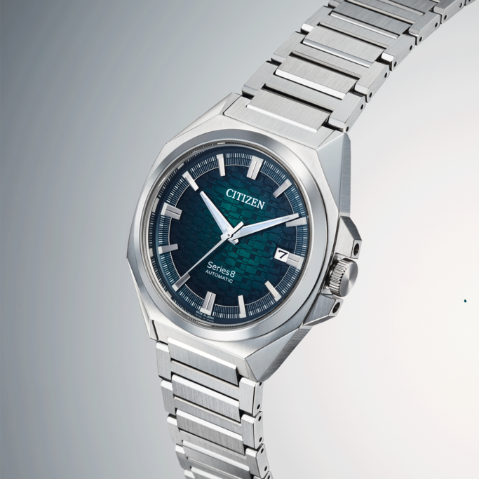 Citizen Series 8 automatic watch with a green dial and steel bracelet.