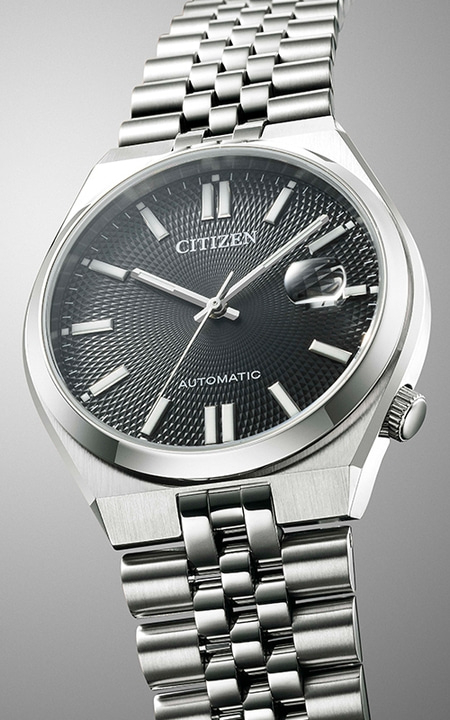 Citizen automatic watch with a black dial and silver bracelet.