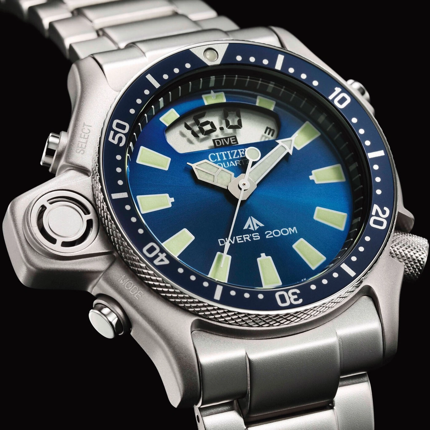 Close-up of a Citizen dive watch with a blue face and silver band.