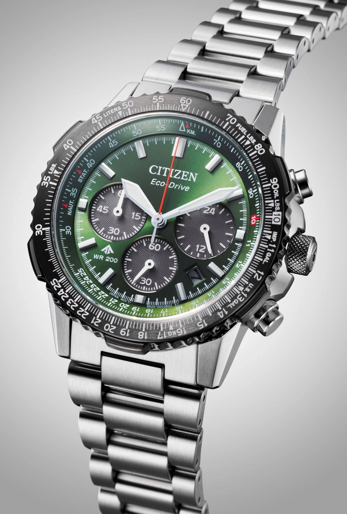 Citizen Eco-Drive watch with green face and stainless steel band, chronograph.