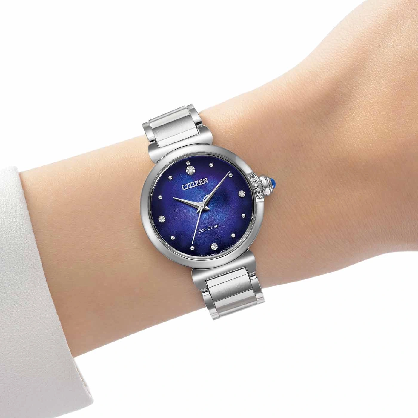 Citizen Eco-Drive watch on wrist, silver band, blue face, diamonds, elegant design