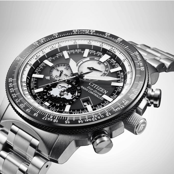 Citizen Eco-Drive watch with multiple dials and a world map design on the face.
