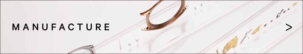 Manufacture text with an arrow, glasses parts on white background.