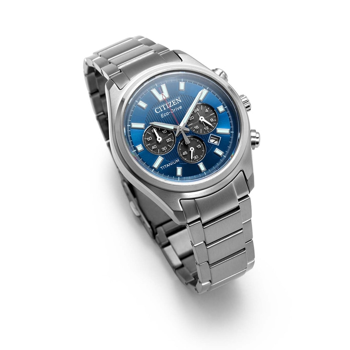 A silver Citizen Eco-Drive chronograph watch with a blue dial.