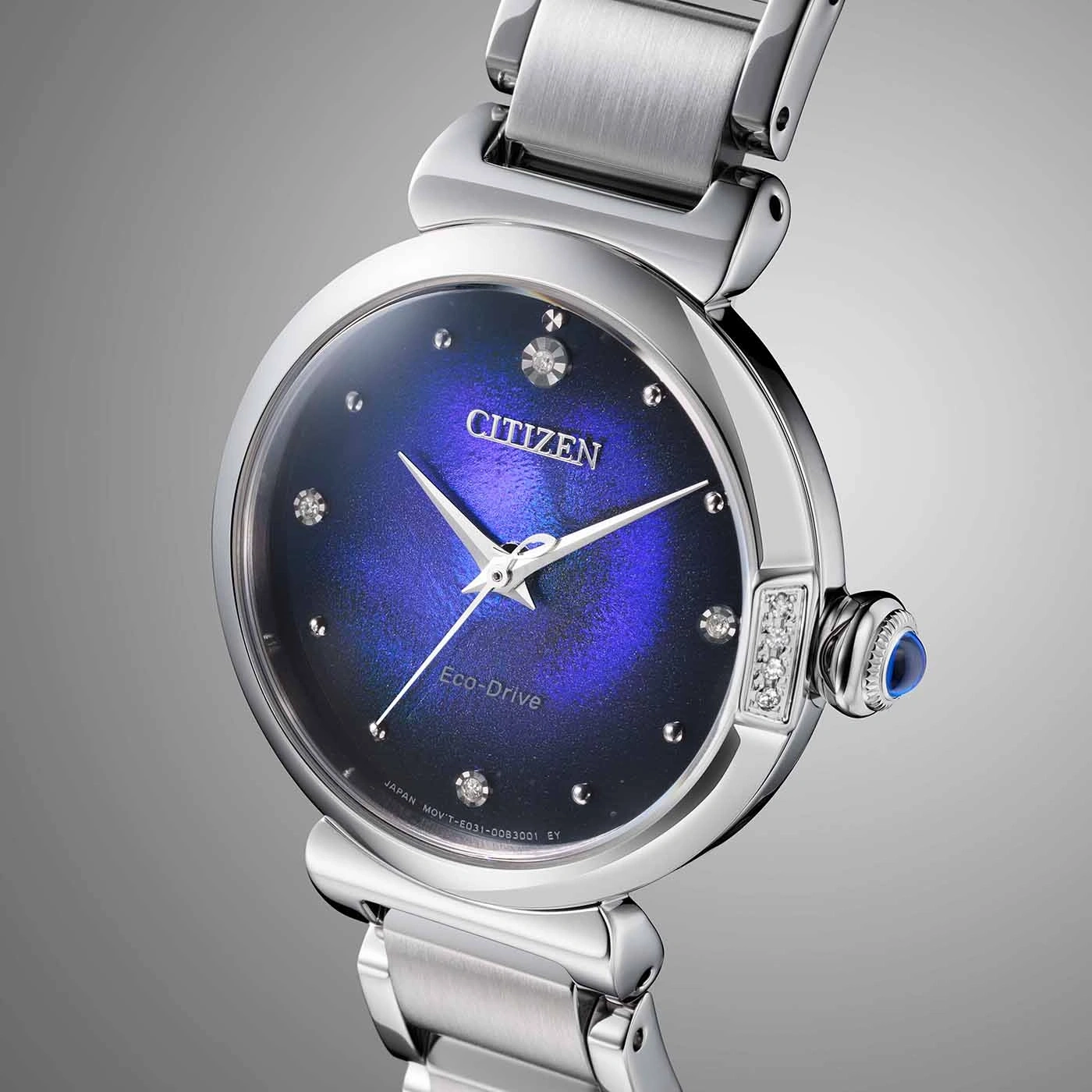 Citizen watch with a blue face and diamond accents, stainless steel band.
