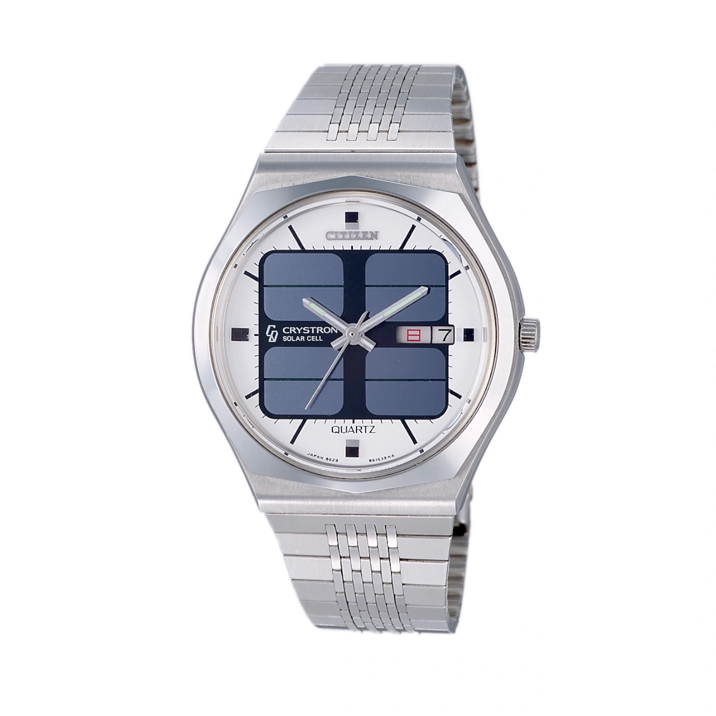 A Citizen Crystron solar cell watch with a digital display and metal band.