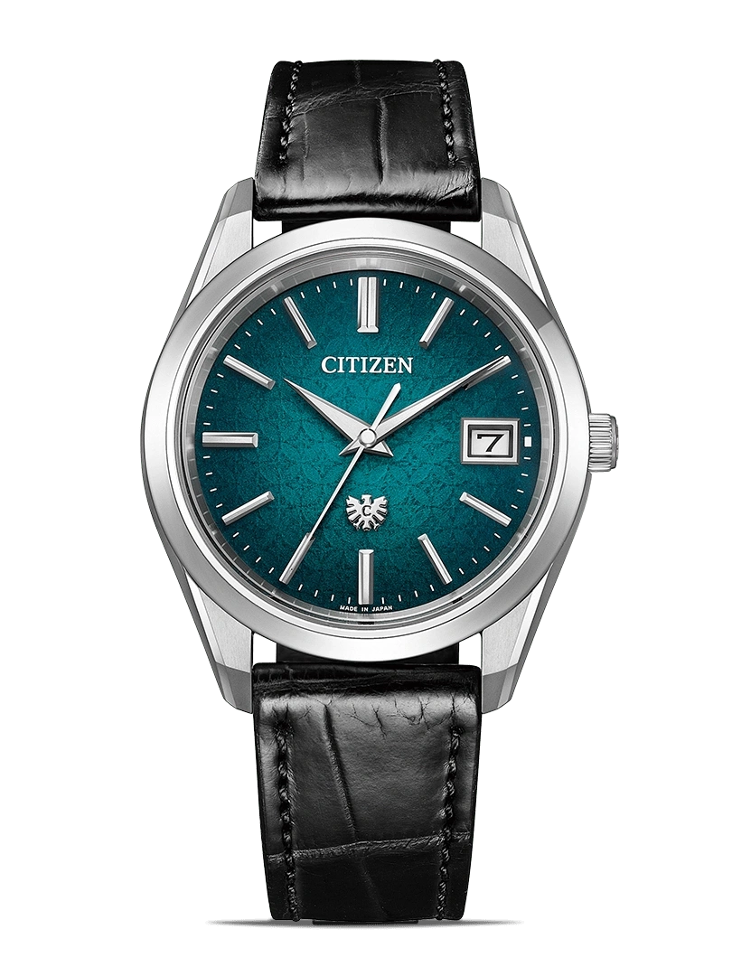 Citizen watch with a teal face and black leather strap, elegant design.