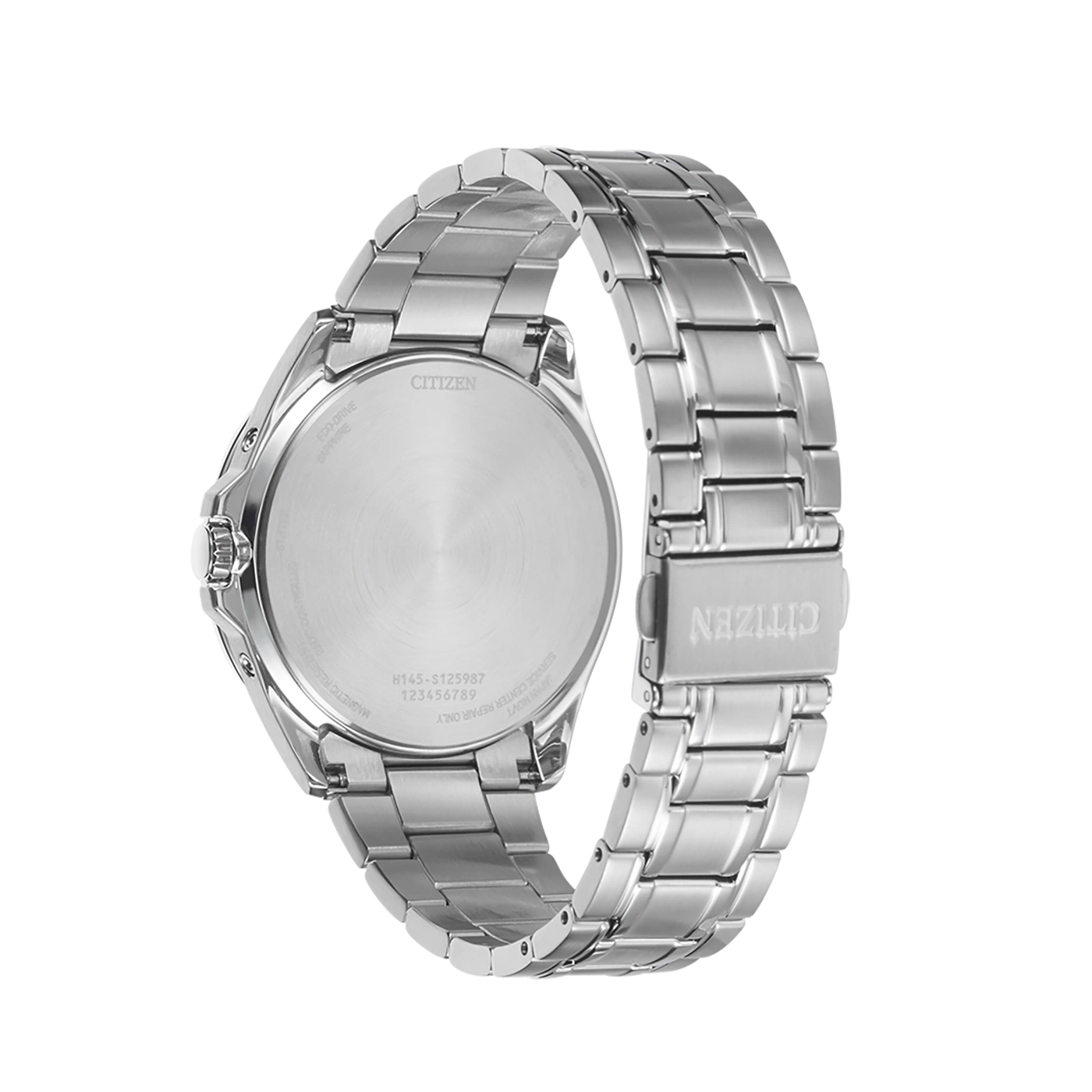 Citizen watch back, silver, with text and numbers, close-up shot.