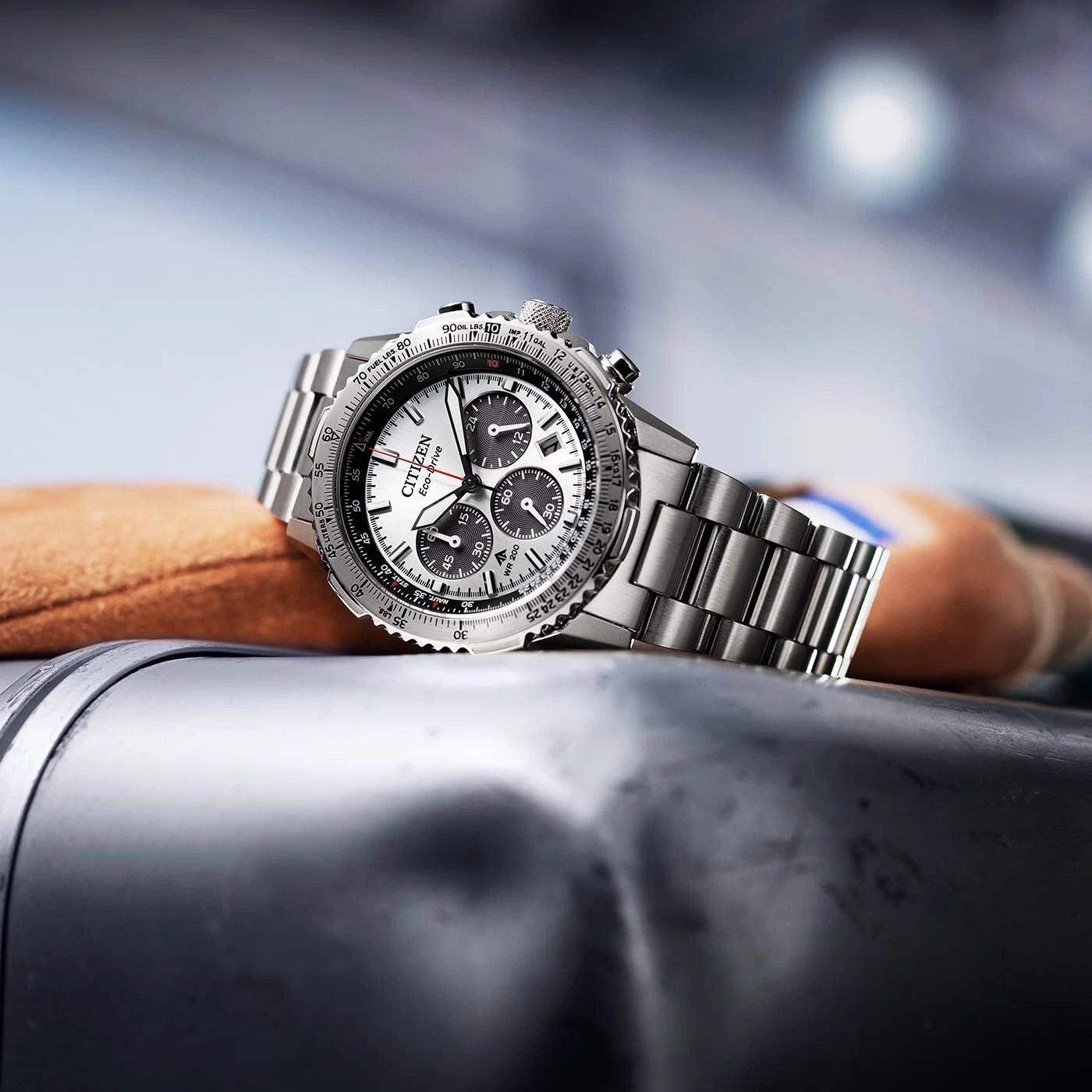 Citizen Eco-Drive watch, silver, black dials, detailed close-up, luxury accessory.