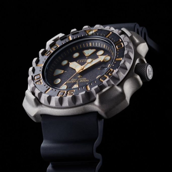 Close-up of a Citizen Eco-Drive diver's watch with a black strap.