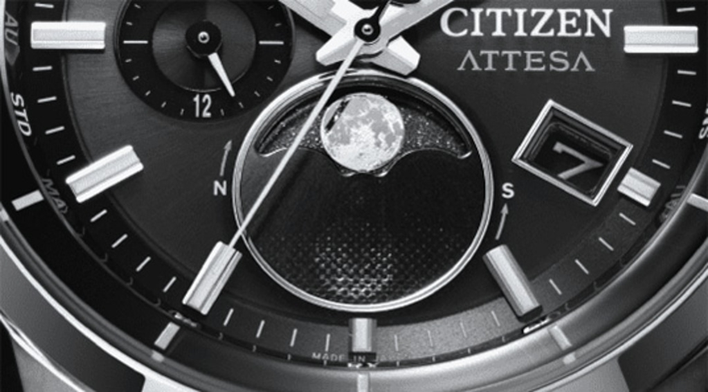Close-up of a Citizen Attesa watch with moon phase and date display.