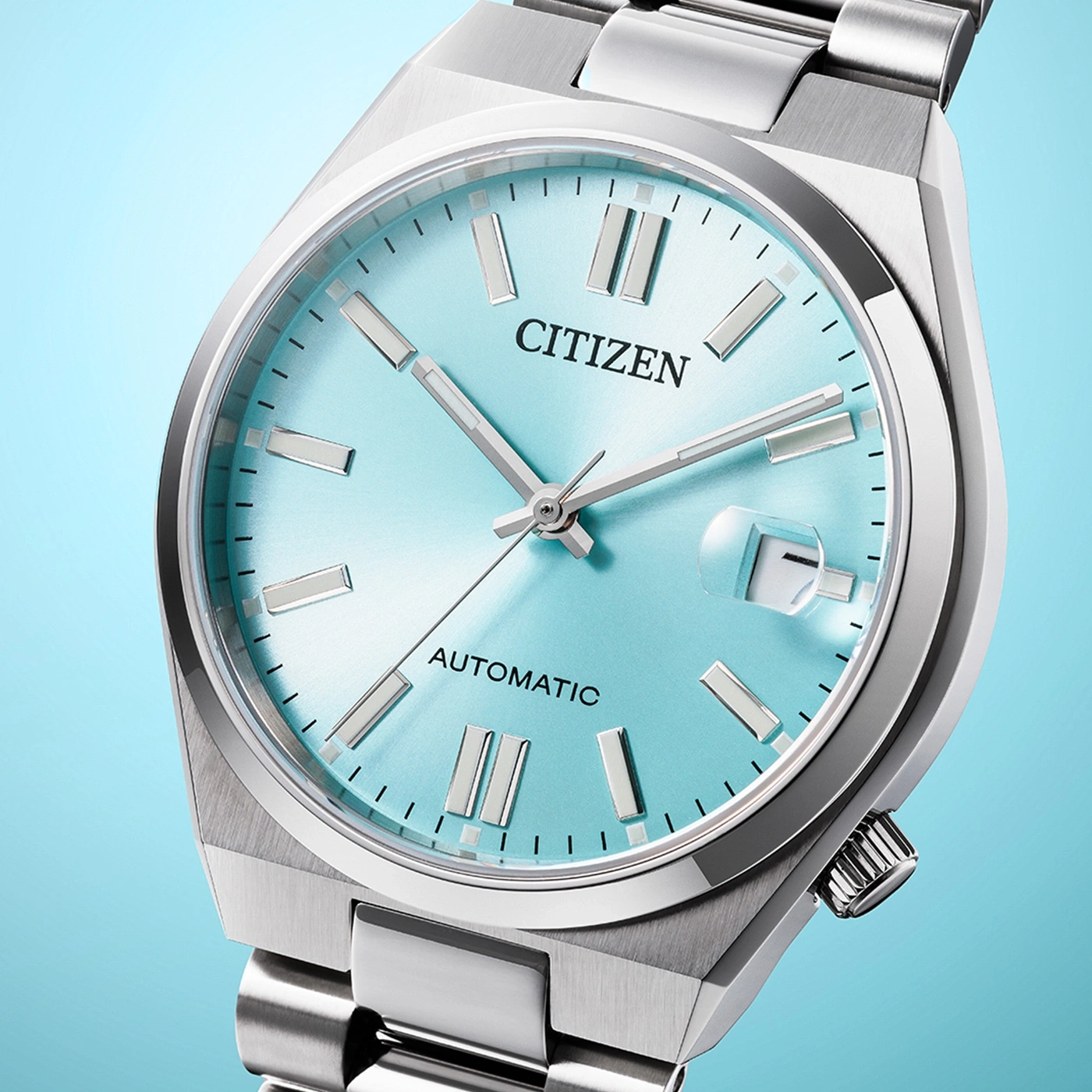 Citizen watch with a light blue face and silver band, automatic.