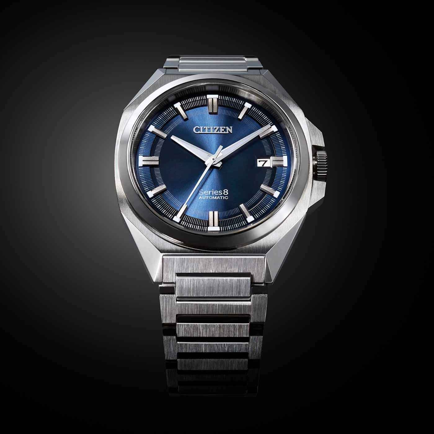 Citizen Series 8 automatic watch with a blue dial and metal strap.
