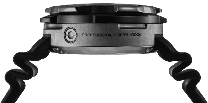 Close-up of a professional diver's watch with a black strap and text.
